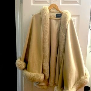 Dry cleaned. Excellent shape.